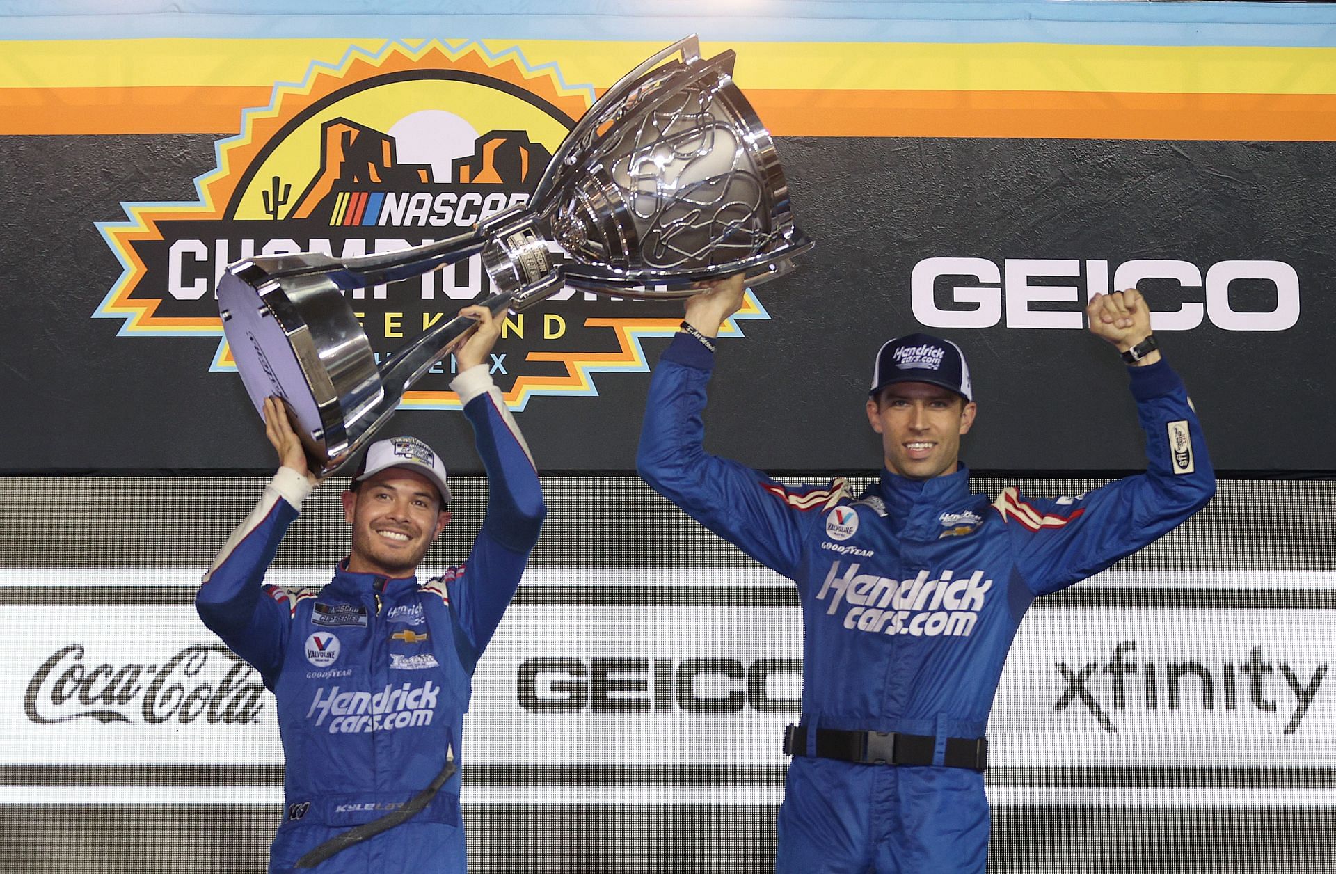 Kyle Larson and crew chief Cliff Daniels celebrate in victory lane after winning the 2021 NASCAR Cup Series. Source: Getty